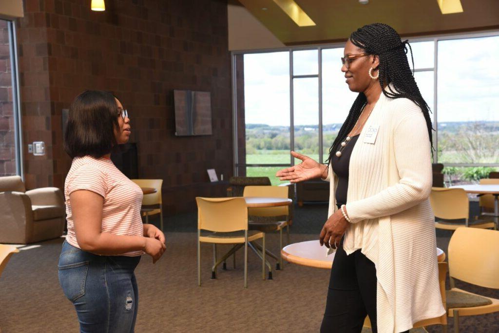 Prospective student speaking to tour guide